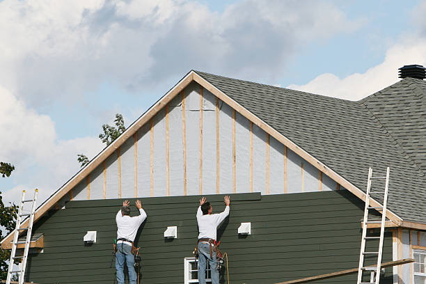 Professional Siding Installation technician working in Levittown, PA